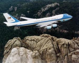 Air Force One flying over Mount Rushmore